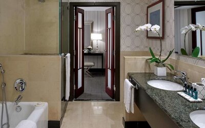Guest bathroom with shower and bath at Sofitel Philadelphia At Rittenhouse Square.