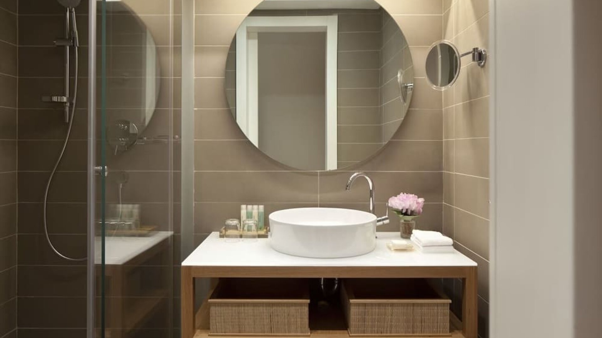 Guest bathroom with shower at Mendeli Street Hotel.