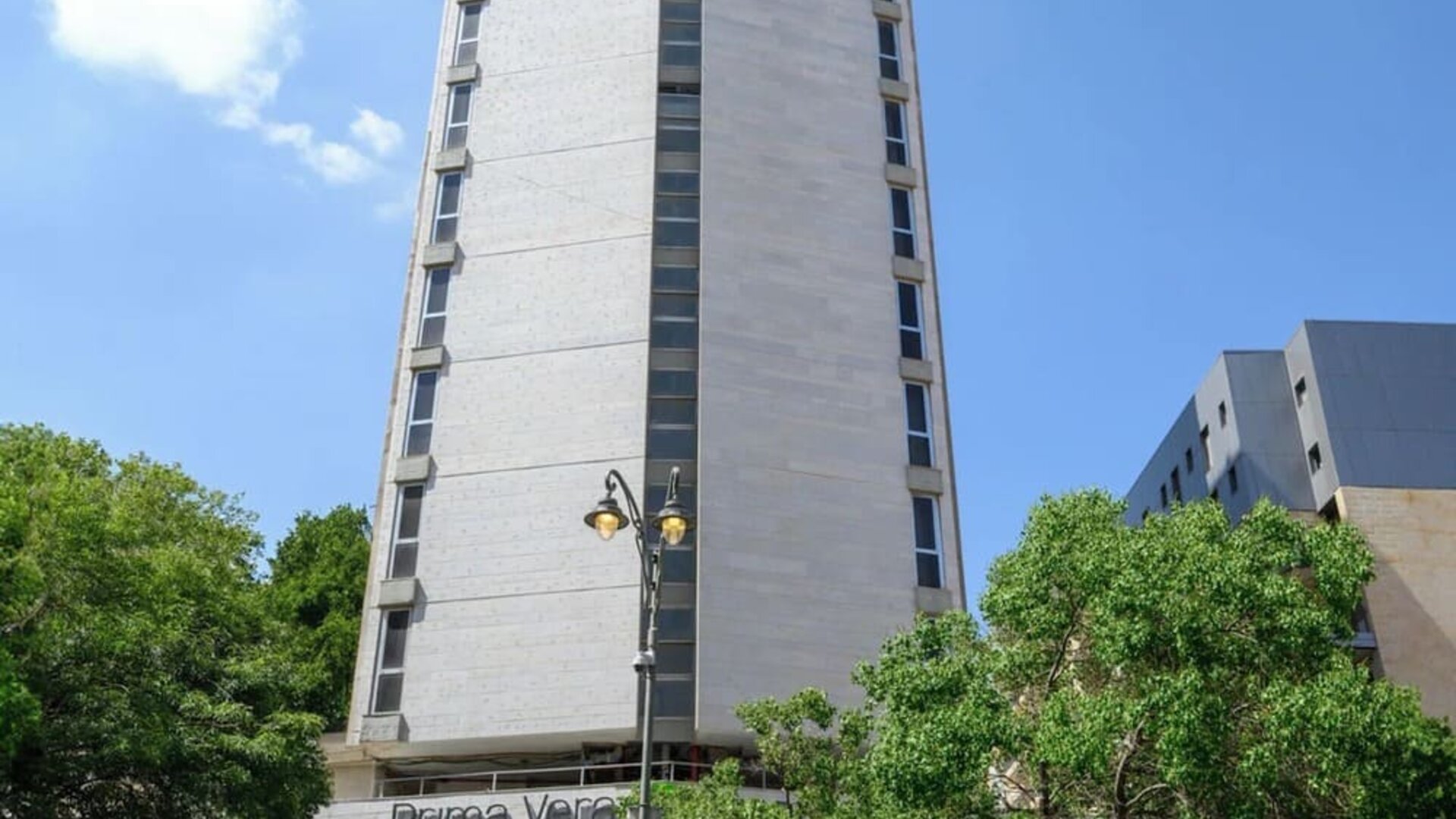 Hotel exterior and parking available at Prima Vera Hotel.