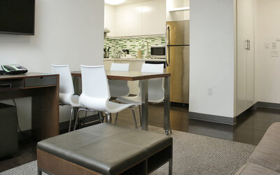 Day room with dining area at Element Miami Doral.