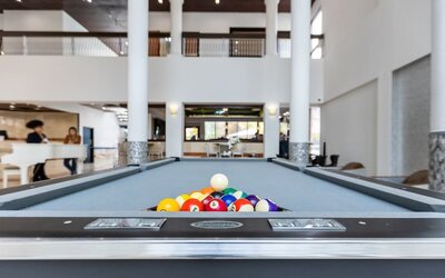 Game room and pool table at Regency Miami Airport By Sonesta.