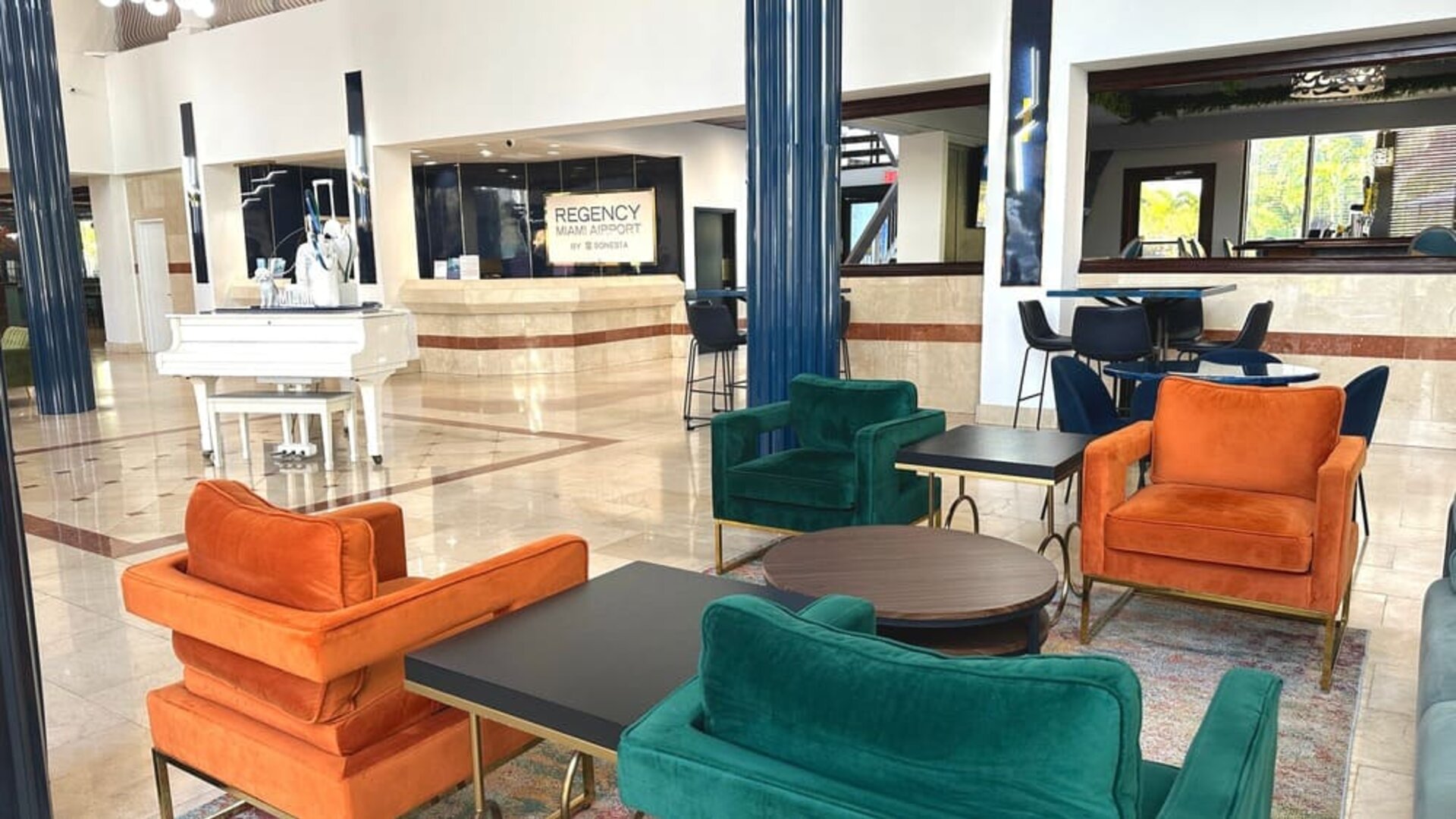 Lobby and lounge at Regency Miami Airport By Sonesta.