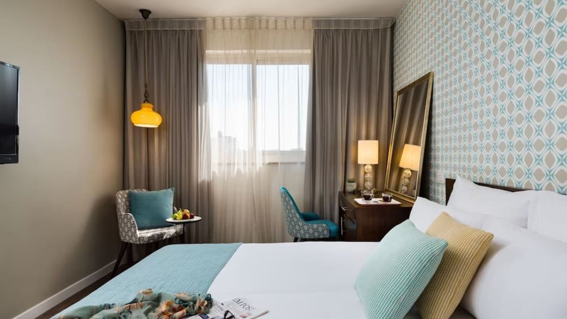 Comfortable king room at Prima Royale Hotel.