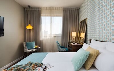 Comfortable king room at Prima Royale Hotel.