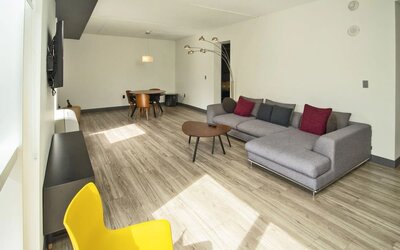 Day room with lounge area at Aloft Miami Doral.
