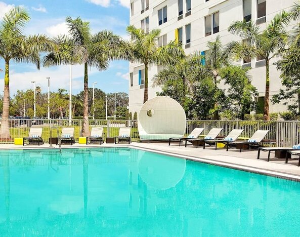 Outdoor pool at Aloft Miami Doral.
