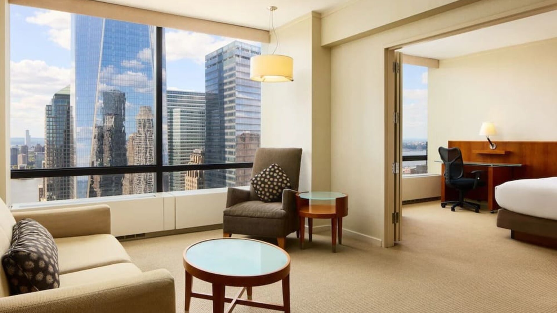 Luxurious king suite with lounge area at M Social New York Downtown.