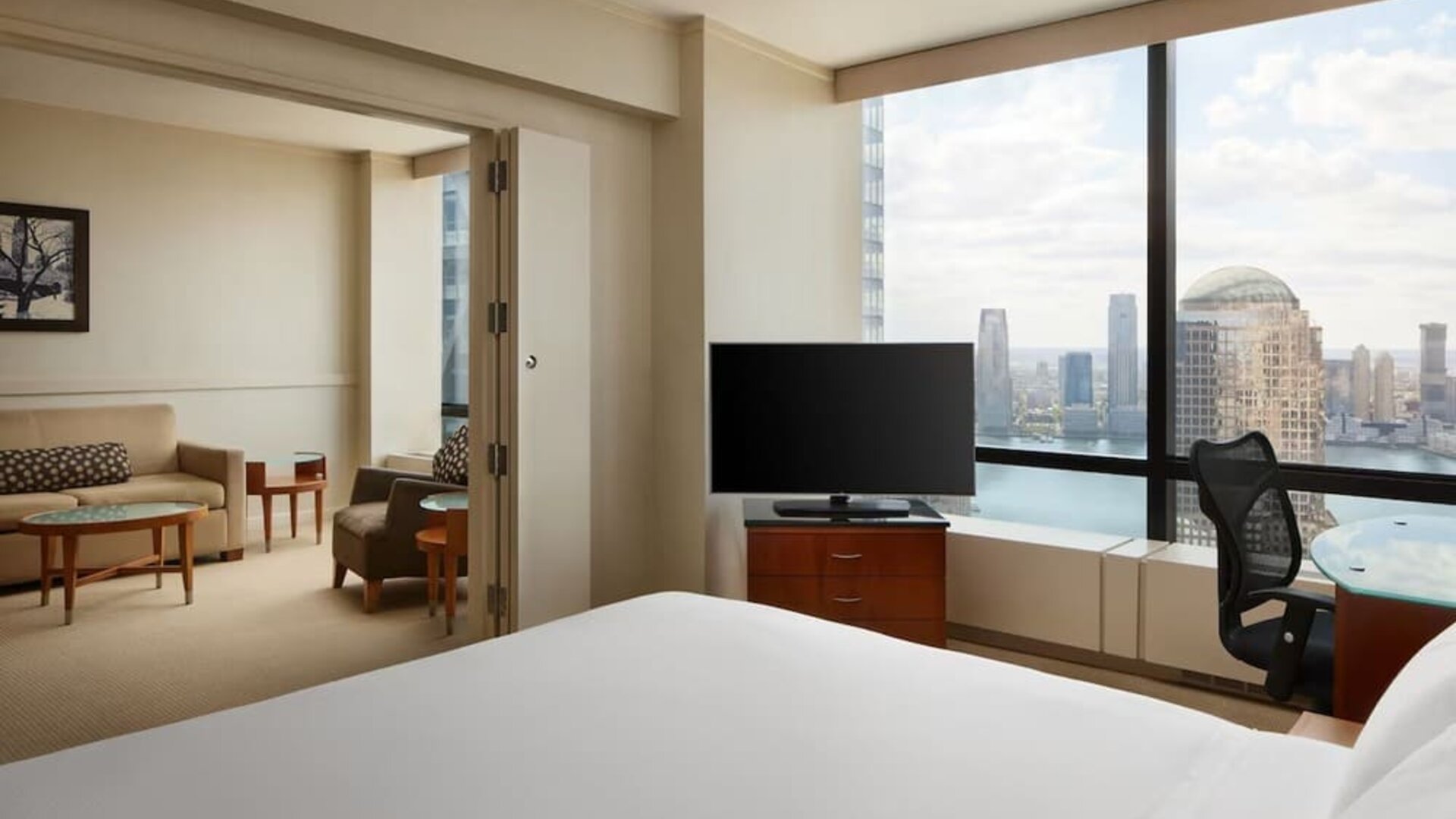 Comfortable day use room with TV and lounge at M Social New York Downtown.