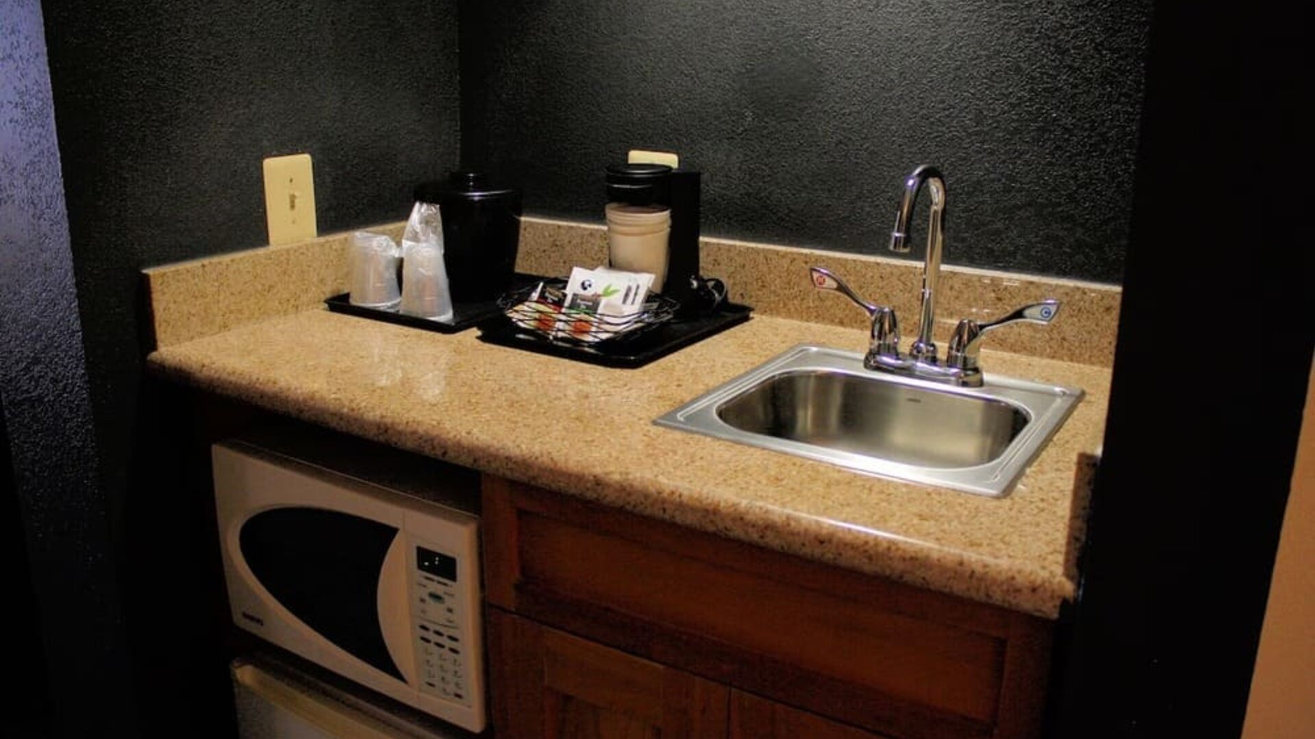 King room with kitchen area at Country Inn & Suites By Radisson, BWI Airport.