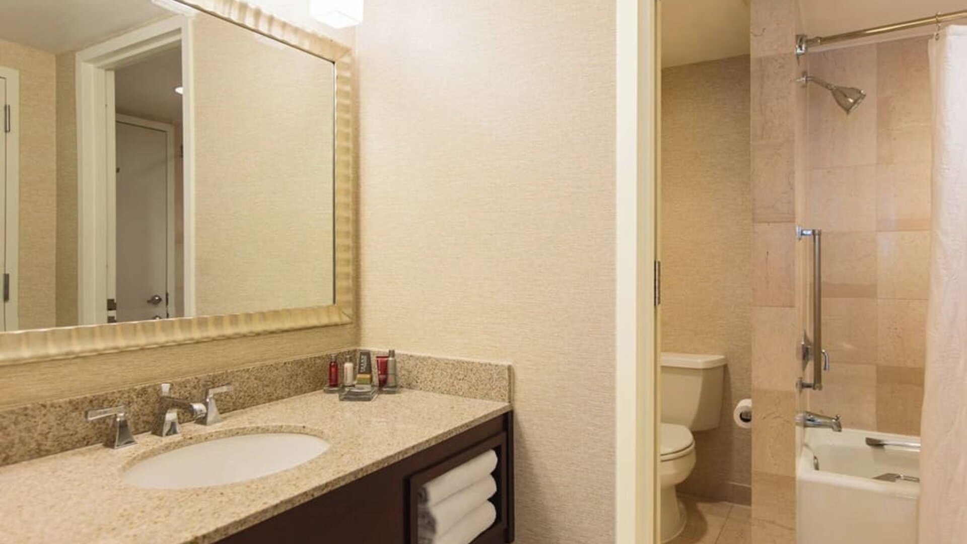 Guest bathroom with shower at Washington Dulles Marriott Suites.