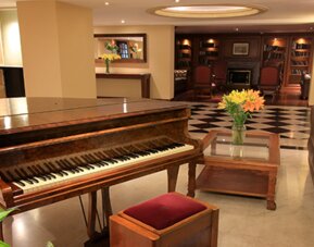 Windsor House Inn By GEH Suites