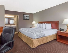 Day room with TV at Days Inn By Wyndham St Augustine/Historic Downtown.