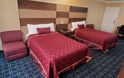 Delmonico Inn & Suites