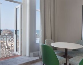 In-room workspace with beautiful view from the balcony at DoubleTree By Hilton Brighton Metropole.