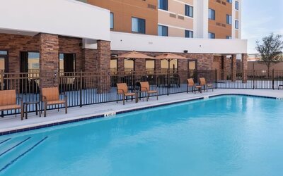 Refreshing outdoor pool at Courtyard By Marriott Houston North/ Shenandoah.
