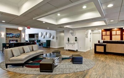 Lobby and coworking lounge at Homewood Suites By Hilton Newark-Cranford.