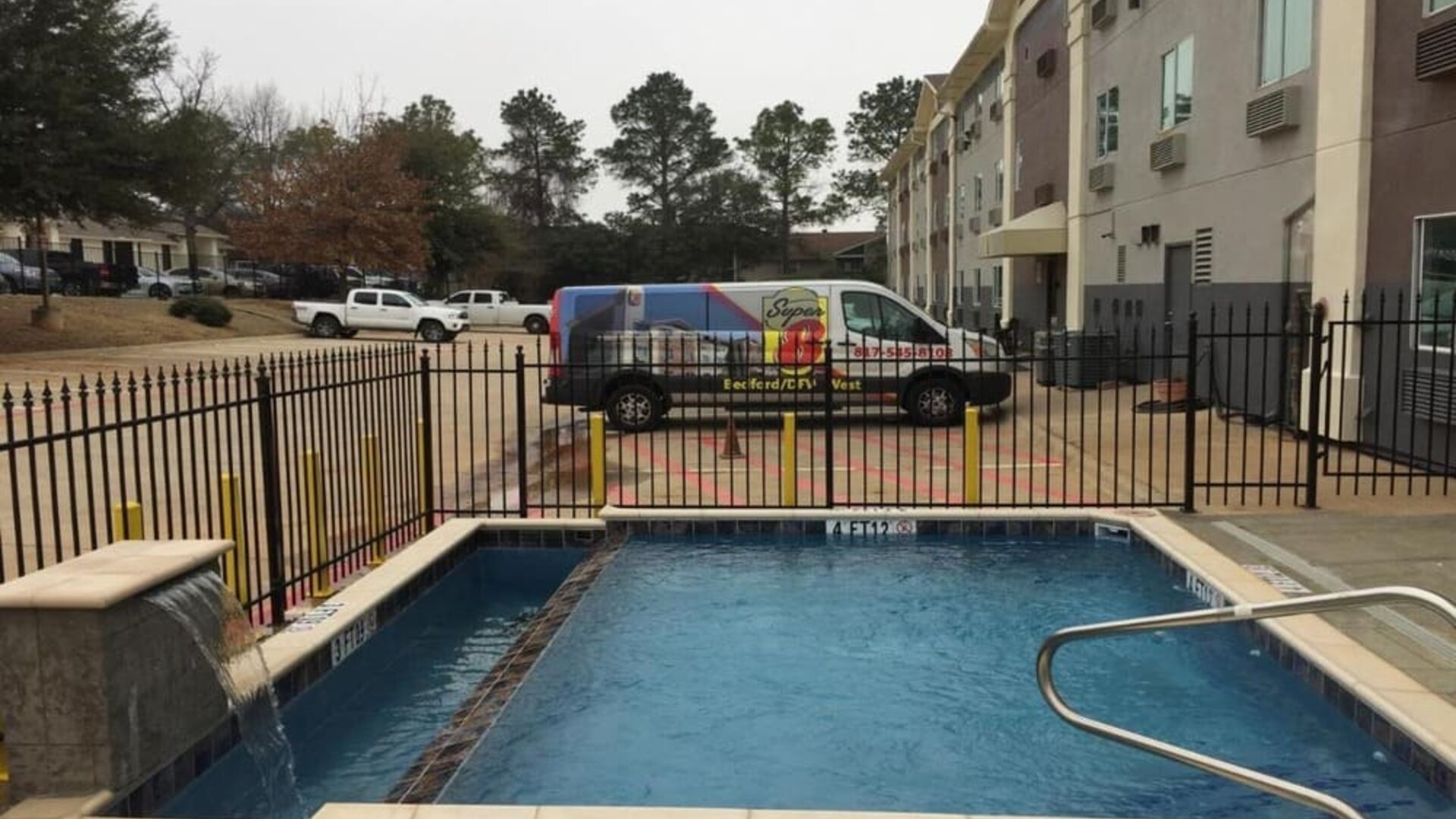 Outdoor pool available at Super 8 Bedford DFW Airport West.  