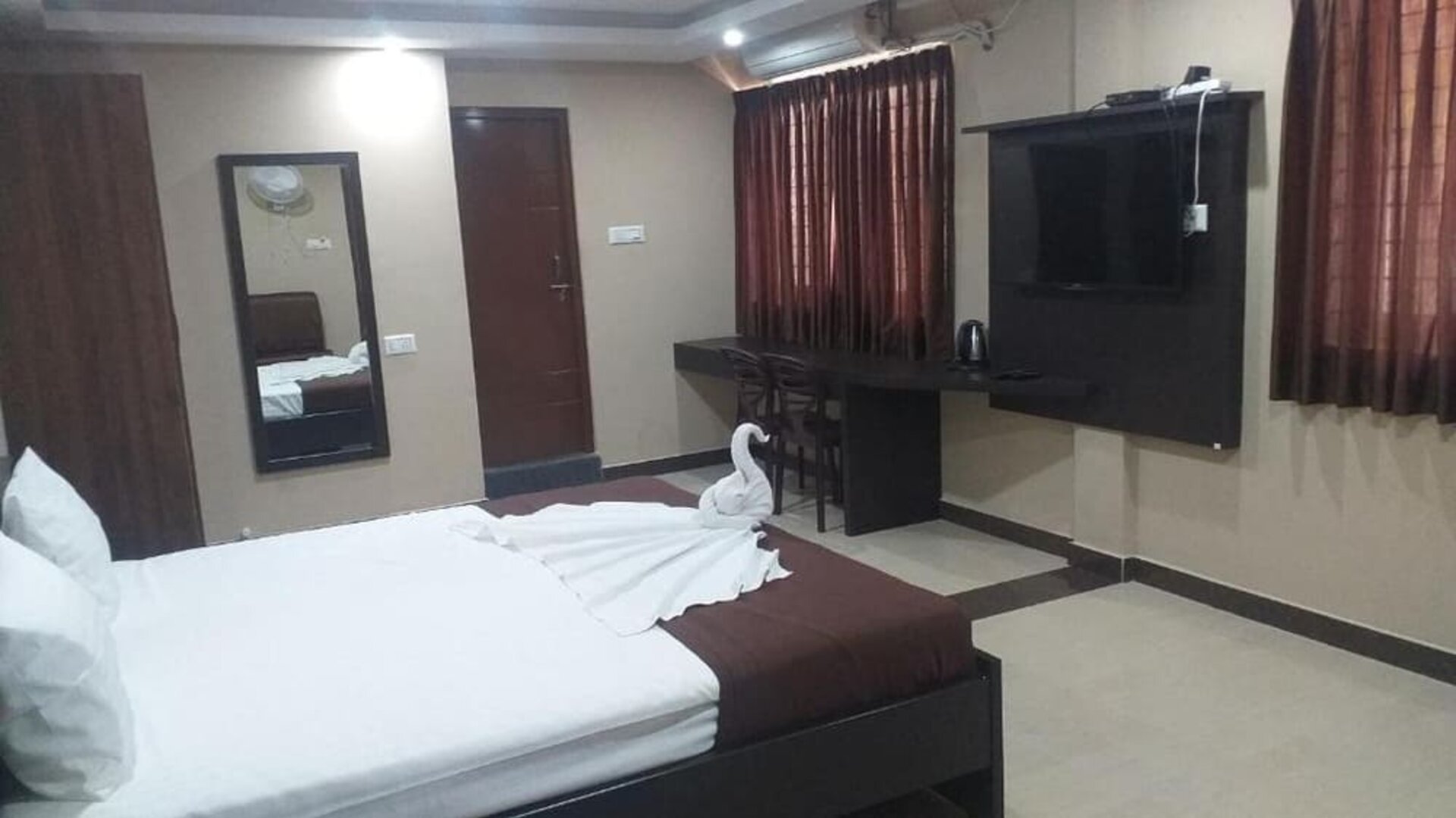 Day use room with TV at The Nisarga Grand.