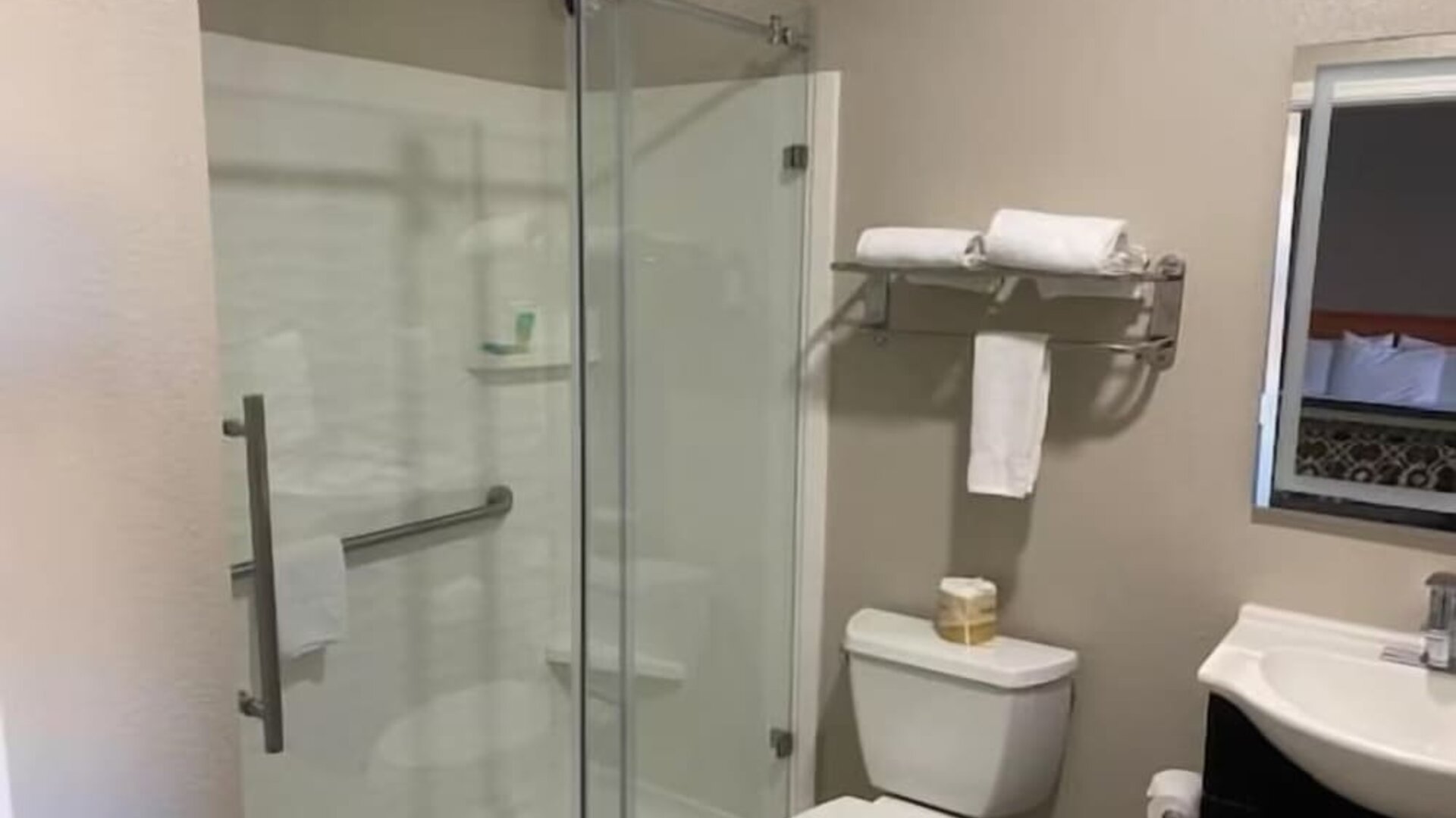 Guest bathroom with shower at North Bay Inn.