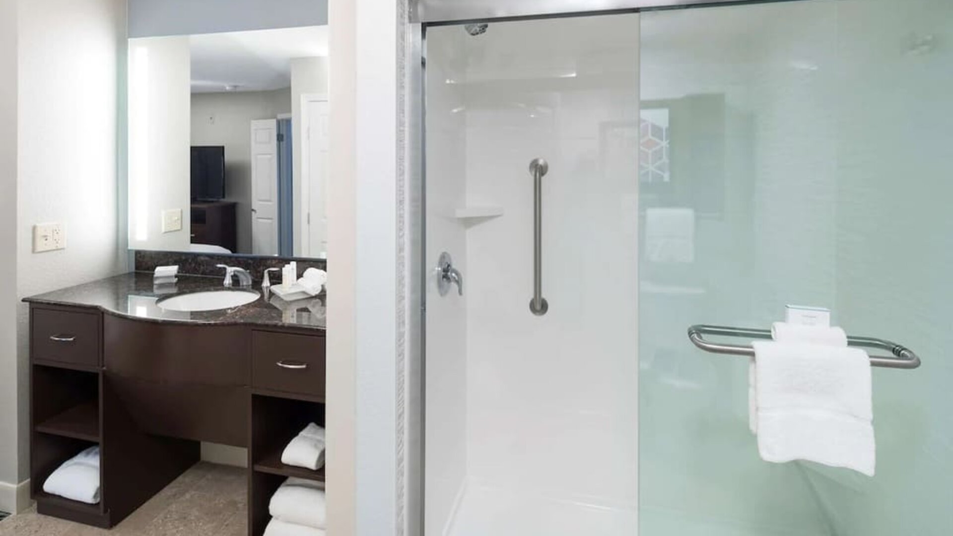 Guest bathroom with shower at Homewood Suites By Hilton Austin NW Near The Domain.