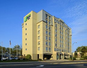 Exterior view of Holiday Inn Express & Suites Boston-Cambridge showcasing its modern architecture and convenient urban location.
