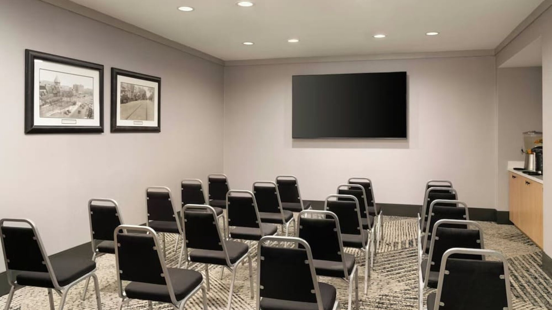 Flexible meeting room equipped for presentations, training sessions, corporate gatherings, and small events at Courtyard by Marriott Boston Brookline.