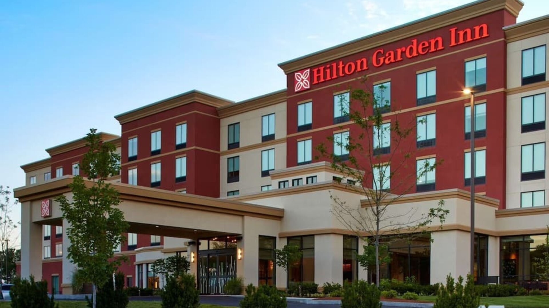 Exterior view of Hilton Garden Inn Boston/Marlborough showcasing modern architecture, landscaped grounds, and convenient access for travelers visiting the Marlborough area.