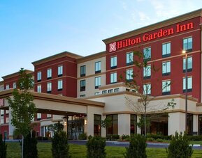 Exterior view of Hilton Garden Inn Boston/Marlborough showcasing modern architecture, landscaped grounds, and convenient access for travelers visiting the Marlborough area.