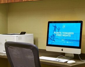 Business center equipped with desktop computer, printing services, and a productive workspace for business travelers staying at Hilton Garden Inn Boston/Marlborough.