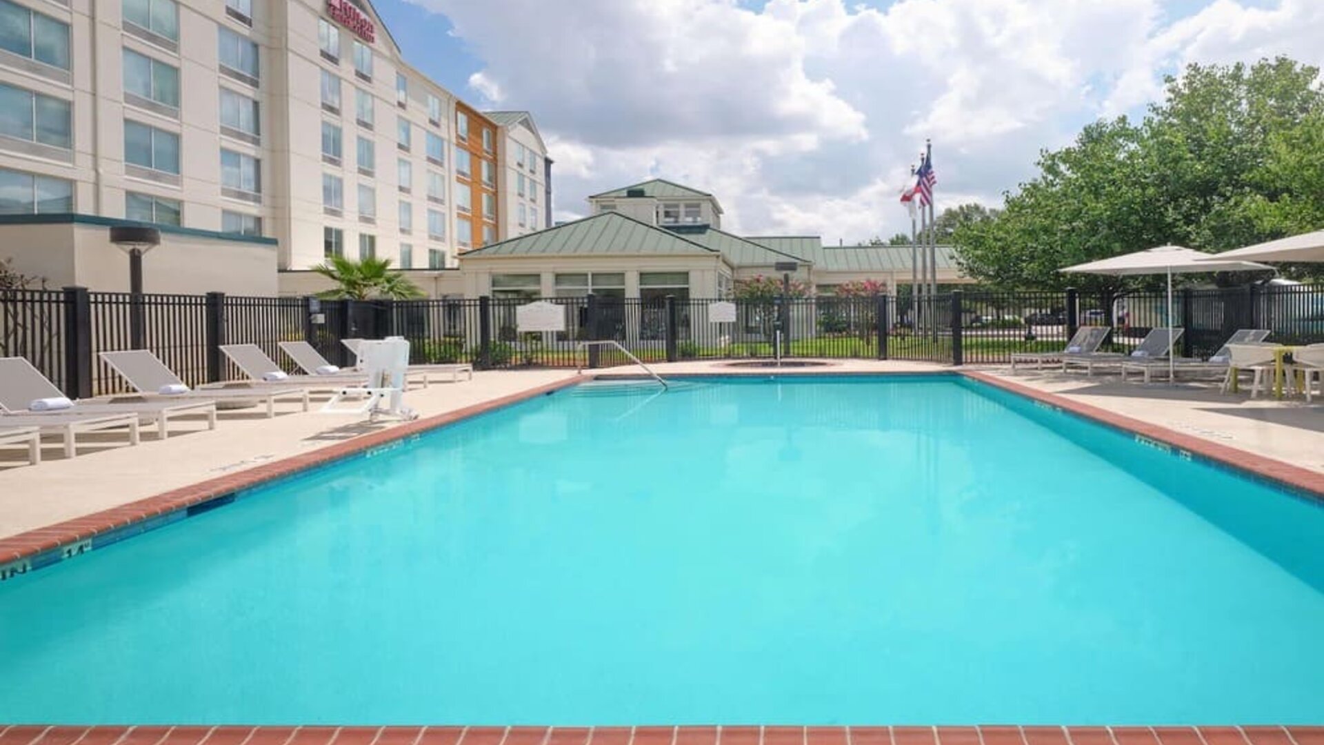 Refreshing outdoor pool at Hilton Garden Inn IAH Houston.