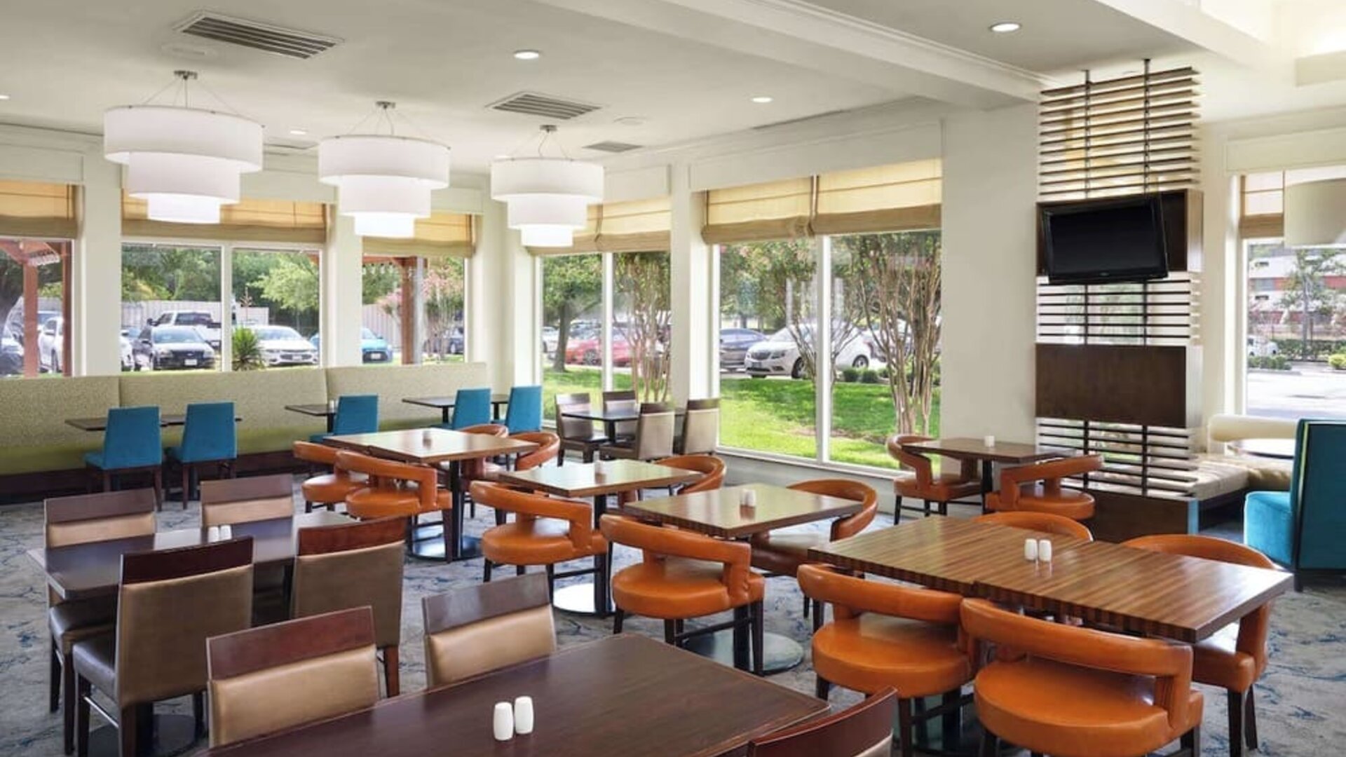Dining area at Hilton Garden Inn IAH Houston.