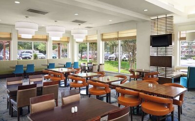 Dining area at Hilton Garden Inn IAH Houston.
