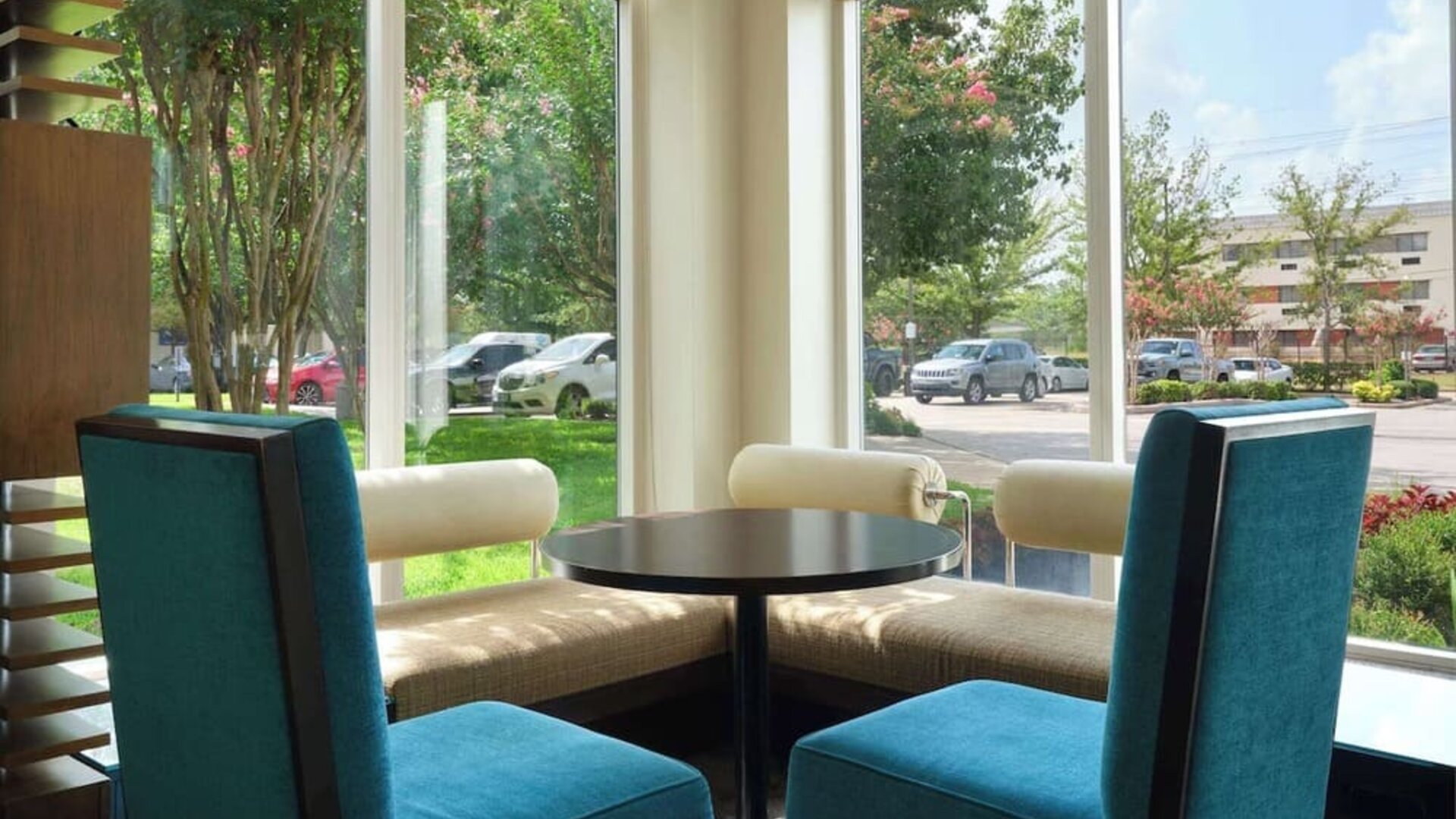 Lobby and coworking lounge at Hilton Garden Inn IAH Houston.