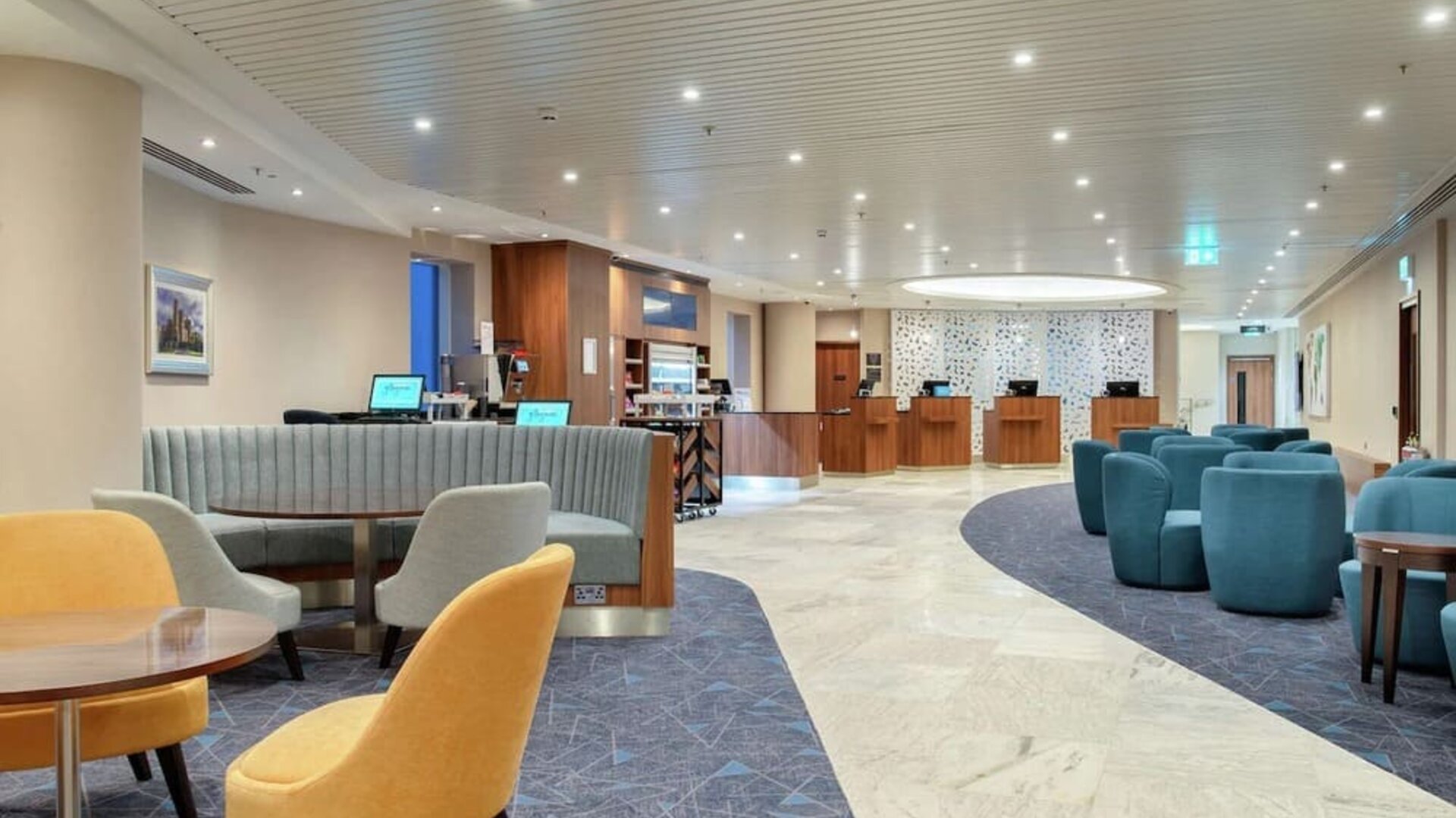 Lobby and coworking lounge at Hilton Garden Inn London Heathrow Terminals 2 And 3.