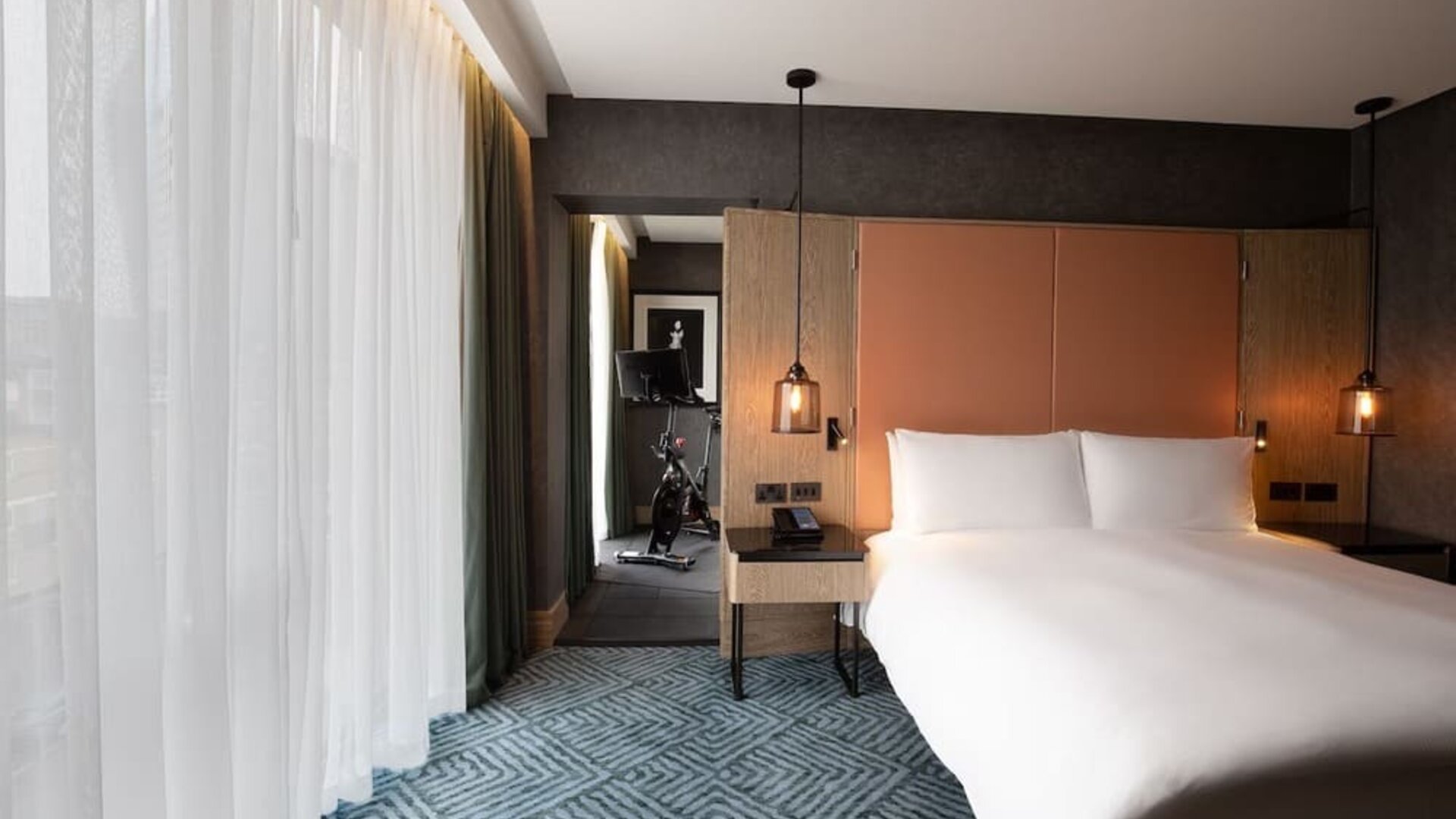 Day use room with fitness equipment at Hilton London Bankside.