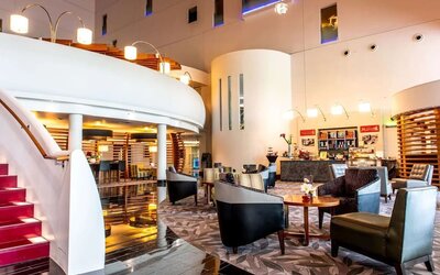 Lobby and coworking lounge at Hilton London Heathrow Airport Terminal 5.