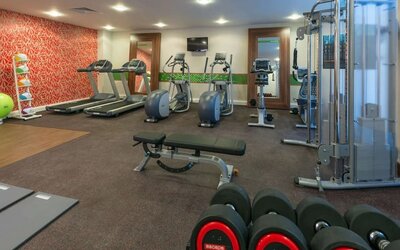 Fitness center available at Hampton By Hilton London Luton Airport.