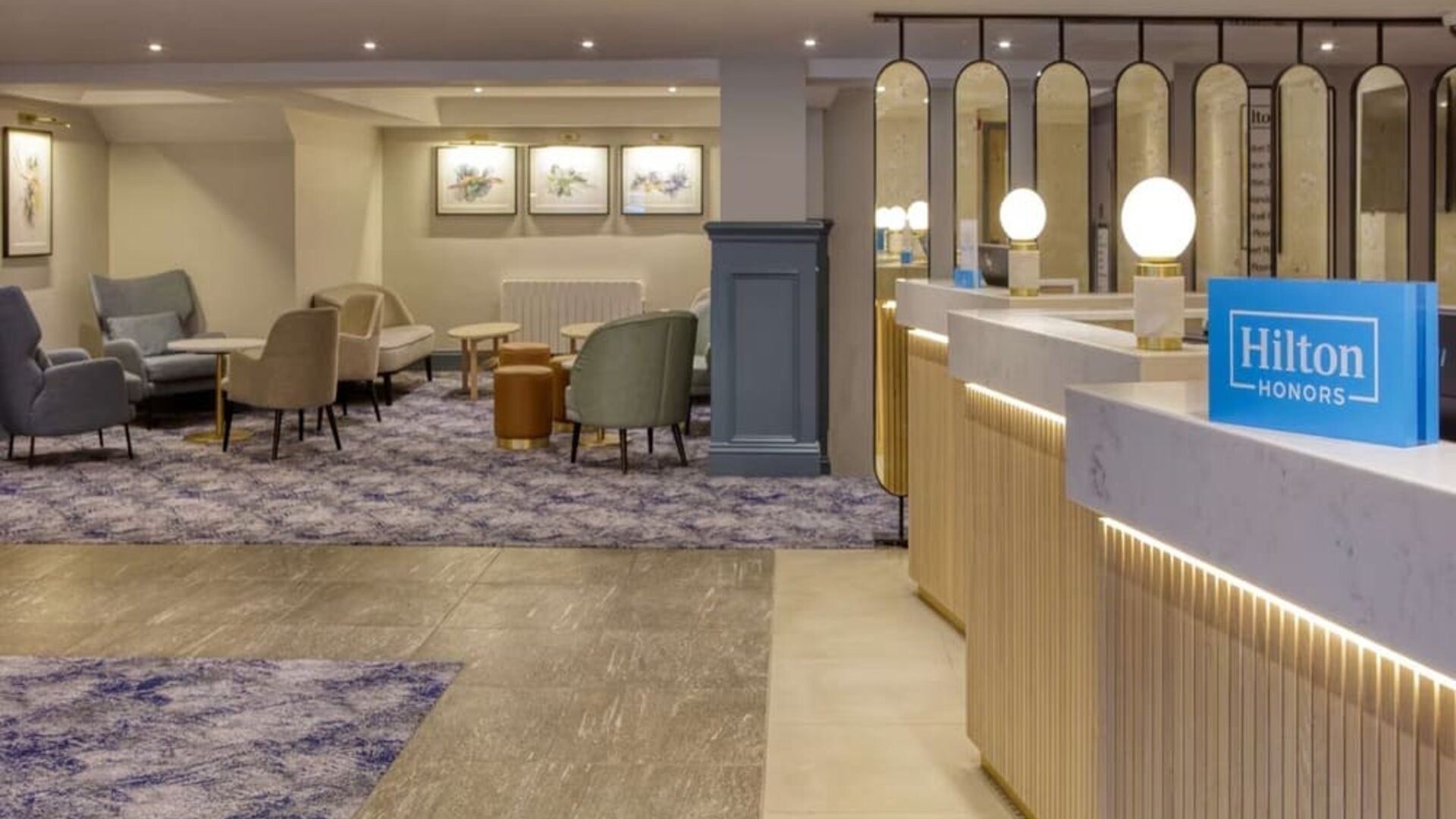 Lobby and coworking lounge at Hilton Cobham.