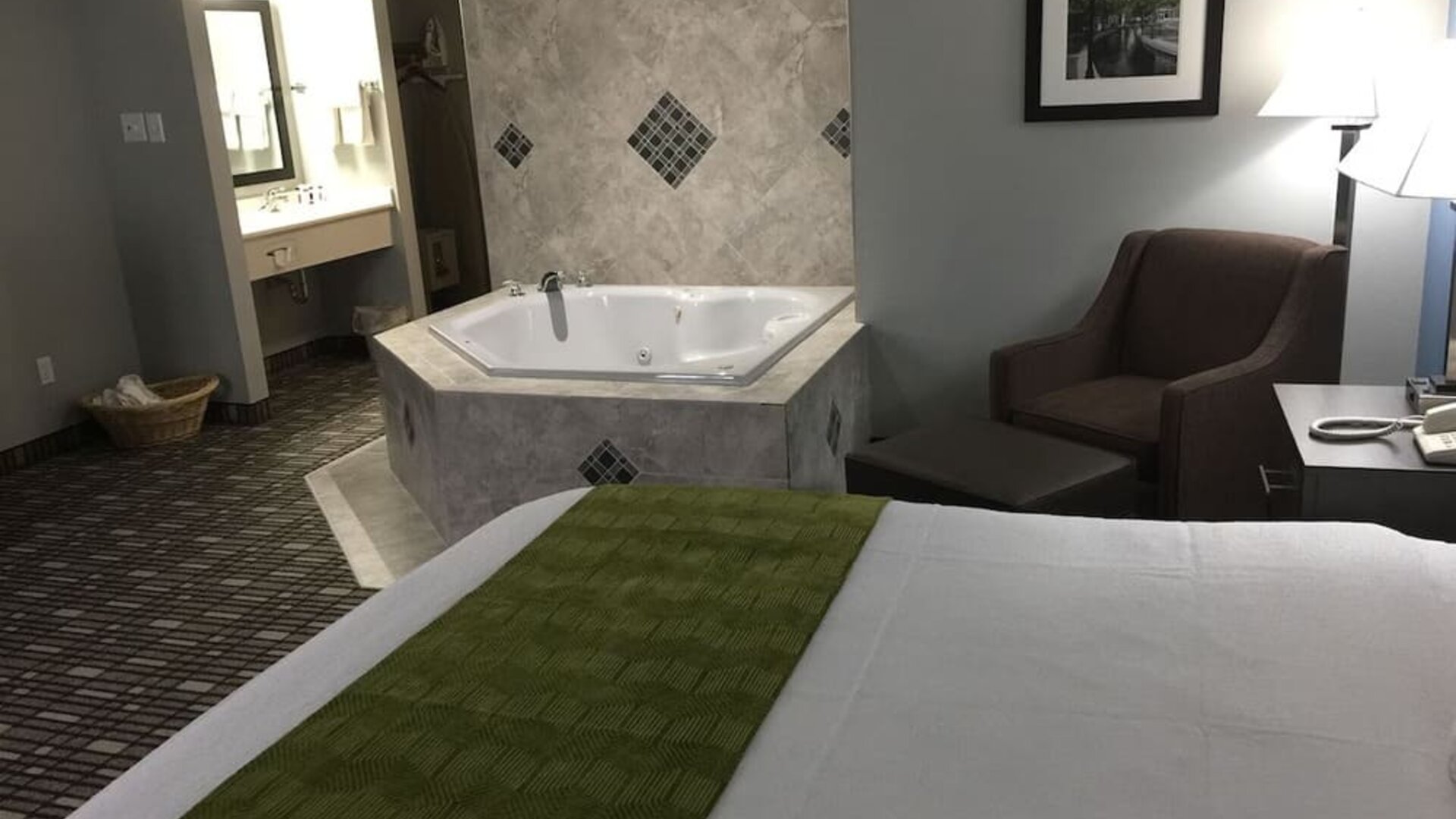 Romantic king room at Baymont By Wyndham Pella.