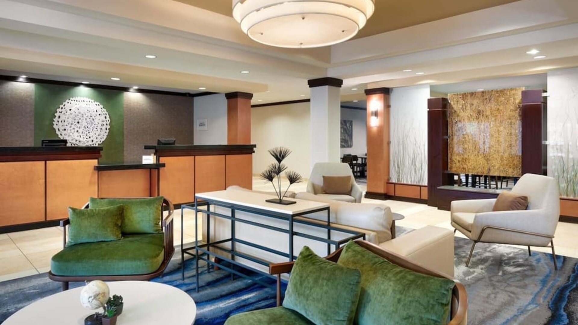 Lobby and coworking lounge at Fairfield Inn & Suites By Marriott Tallahassee Central.
