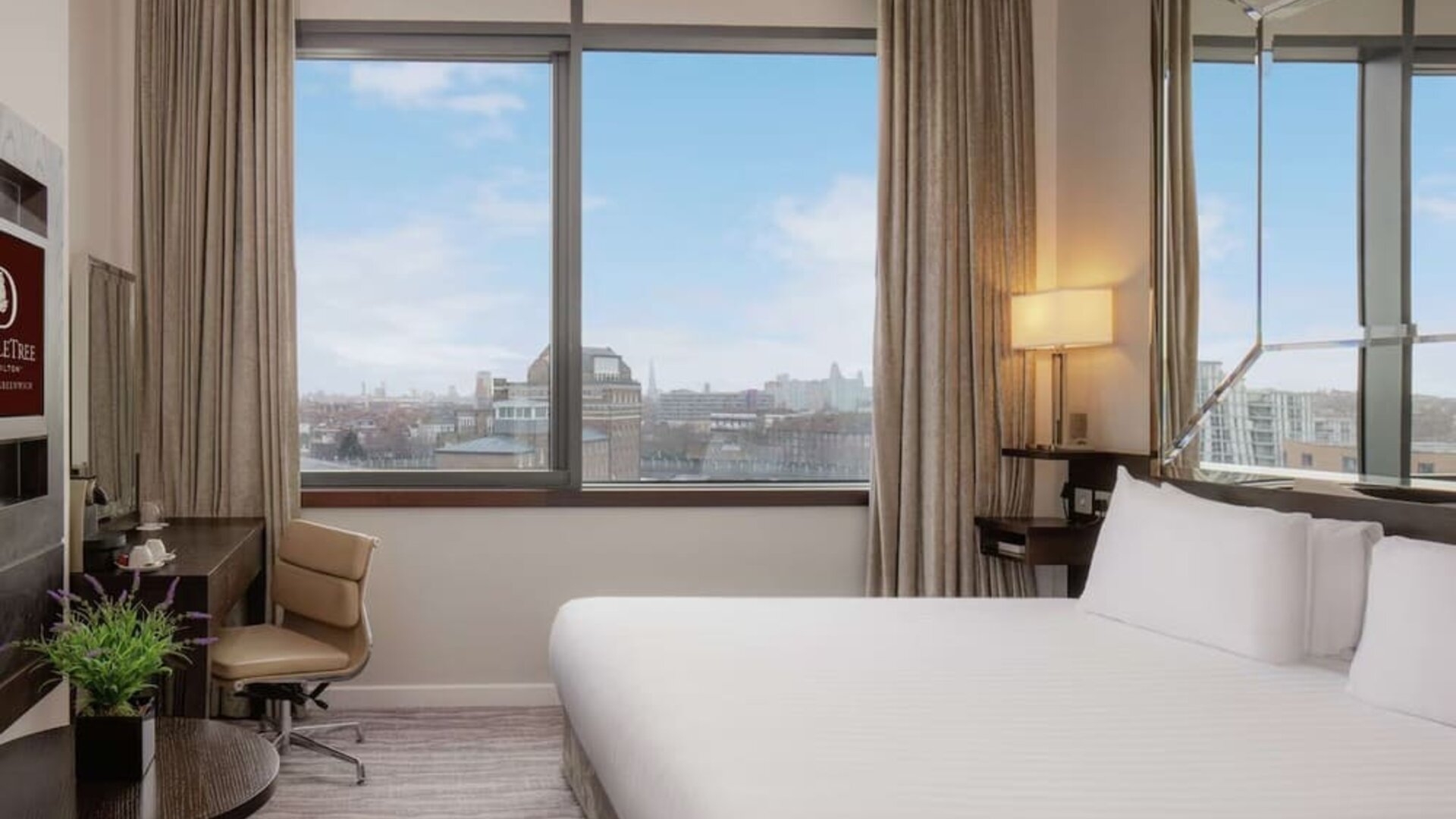 Comfortable king room with work desk at DoubleTree by Hilton London Greenwich.