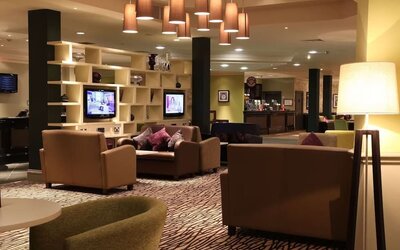 Lobby and coworking lounge at Doubletree by Hilton Glasgow Strathclyde.