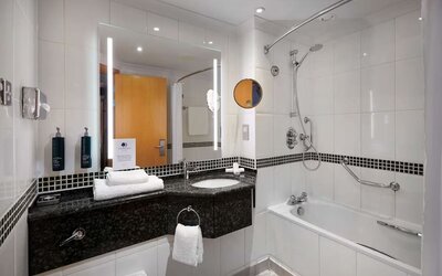 Guest bathroom with shower at DoubleTree by Hilton Swindon.