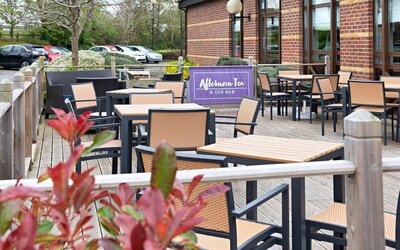 Hotel bar with outdoor seating at DoubleTree by Hilton Swindon.