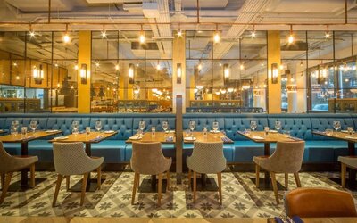 Modern dining area perfect for coworking at DoubleTree by Hilton London Kingston upon Thames.