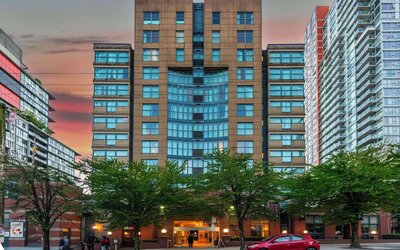 Hotel exterior and city view at Grand Park Hotel & Suites Downtown Vancouver.