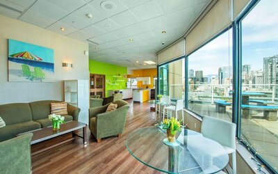 Lounge and coworking area at Grand Park Hotel & Suites Downtown Vancouver.
