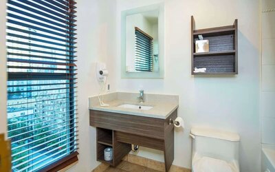 Guest bathroom at Grand Park Hotel & Suites Downtown Vancouver.