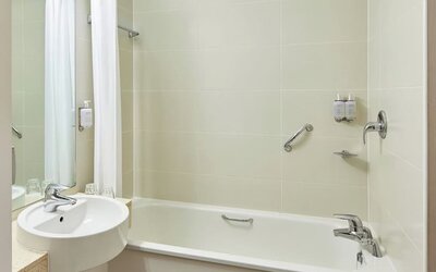 Guest bathroom with shower at  Leonardo Hotel Bradford.