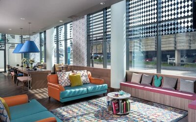 Lobby and coworking lounge at Leonardo Hotel Brighton.